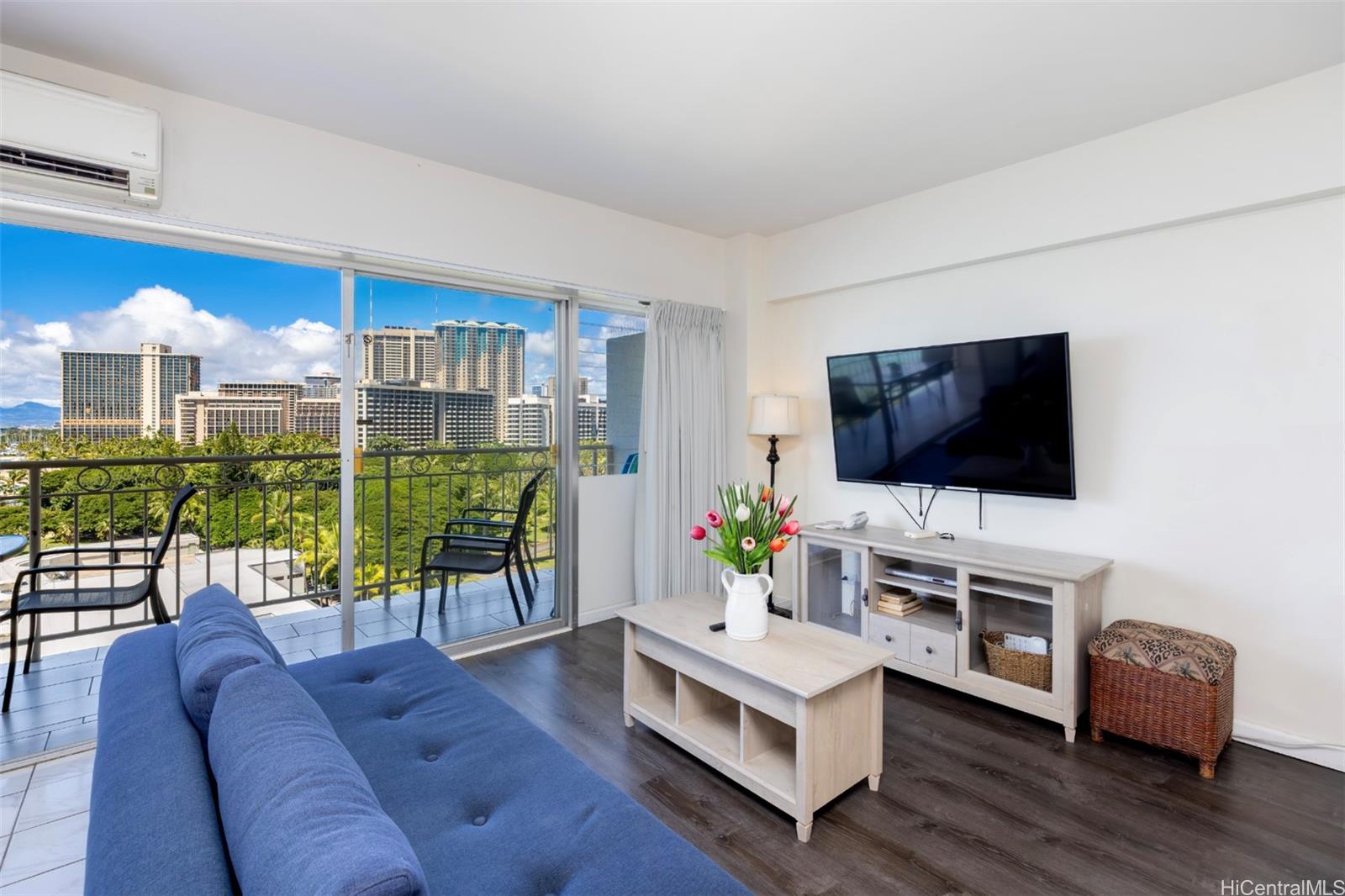2161 Kalia Road, Unit 1012 Honolulu, HI 96815 - Photo 13 of 25 a living room with furniture and a flat screen tv