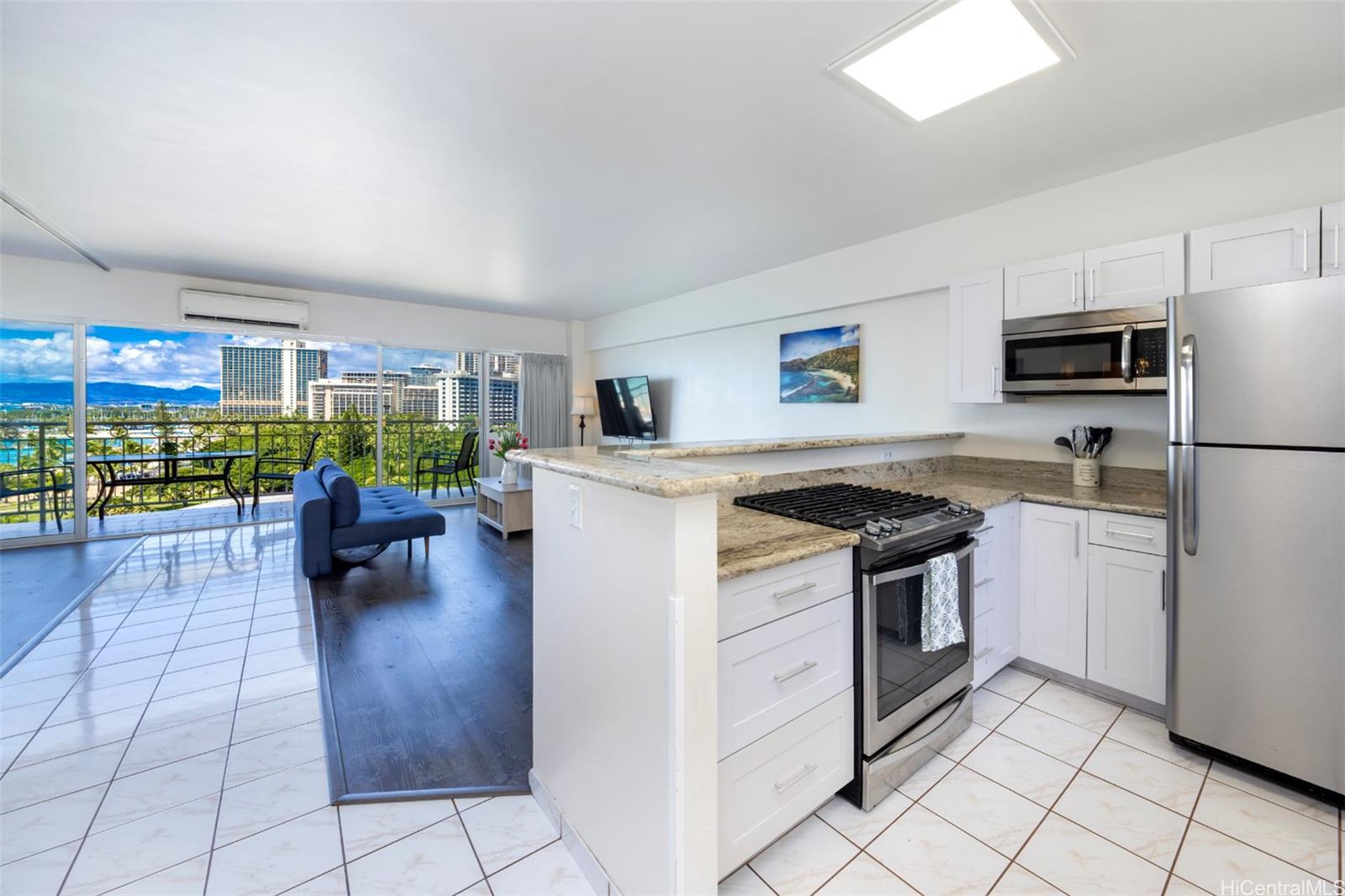 2161 Kalia Road, Unit 1012 Honolulu, HI 96815 - Photo 18 of 25 a kitchen with counter top space and stainless steel appliances