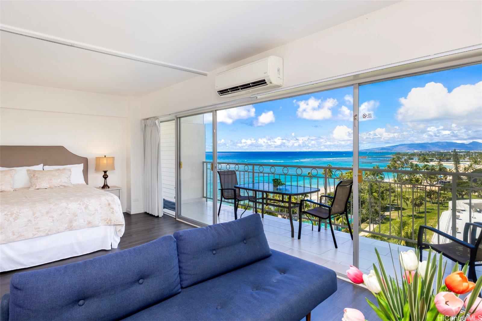 2161 Kalia Road, Unit 1012 Honolulu, HI 96815 - Photo 9 of 25 a living room with furniture a floor to ceiling window and floor to ceiling window