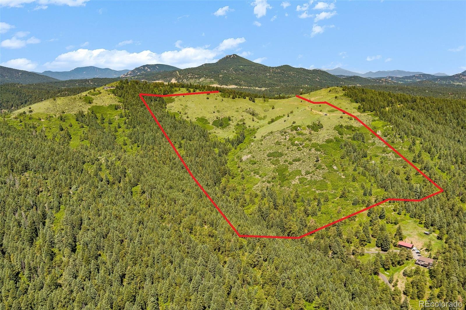 8529 South Deer Creek Canyon Road Morrison, CO 80465 - Photo 3 of 30 a view of lake and mountain