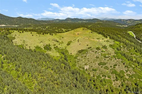 a view of a big yard with green space