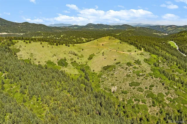 a view of a big yard with green space