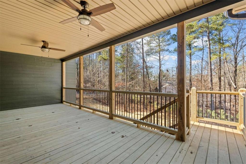 7213 Tara Drive Villa Rica, GA 30180 - Photo 34 of 42 a view of a porch with wooden floor