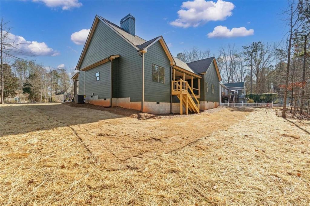 7213 Tara Drive Villa Rica, GA 30180 - Photo 36 of 42 a view of a house with a snow in a yard