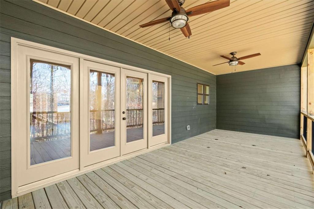 7213 Tara Drive Villa Rica, GA 30180 - Photo 5 of 42 a bedroom with a bed and a ceiling fan