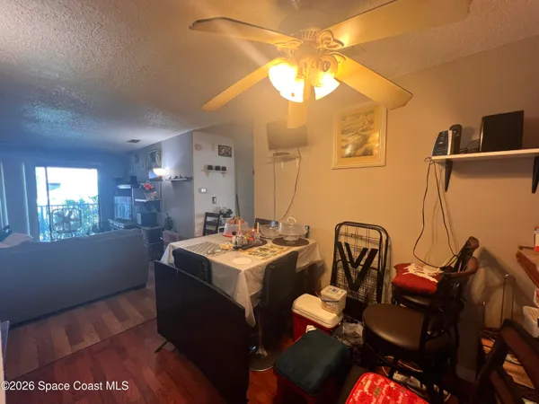 a bathroom with a sink mirror and vanity