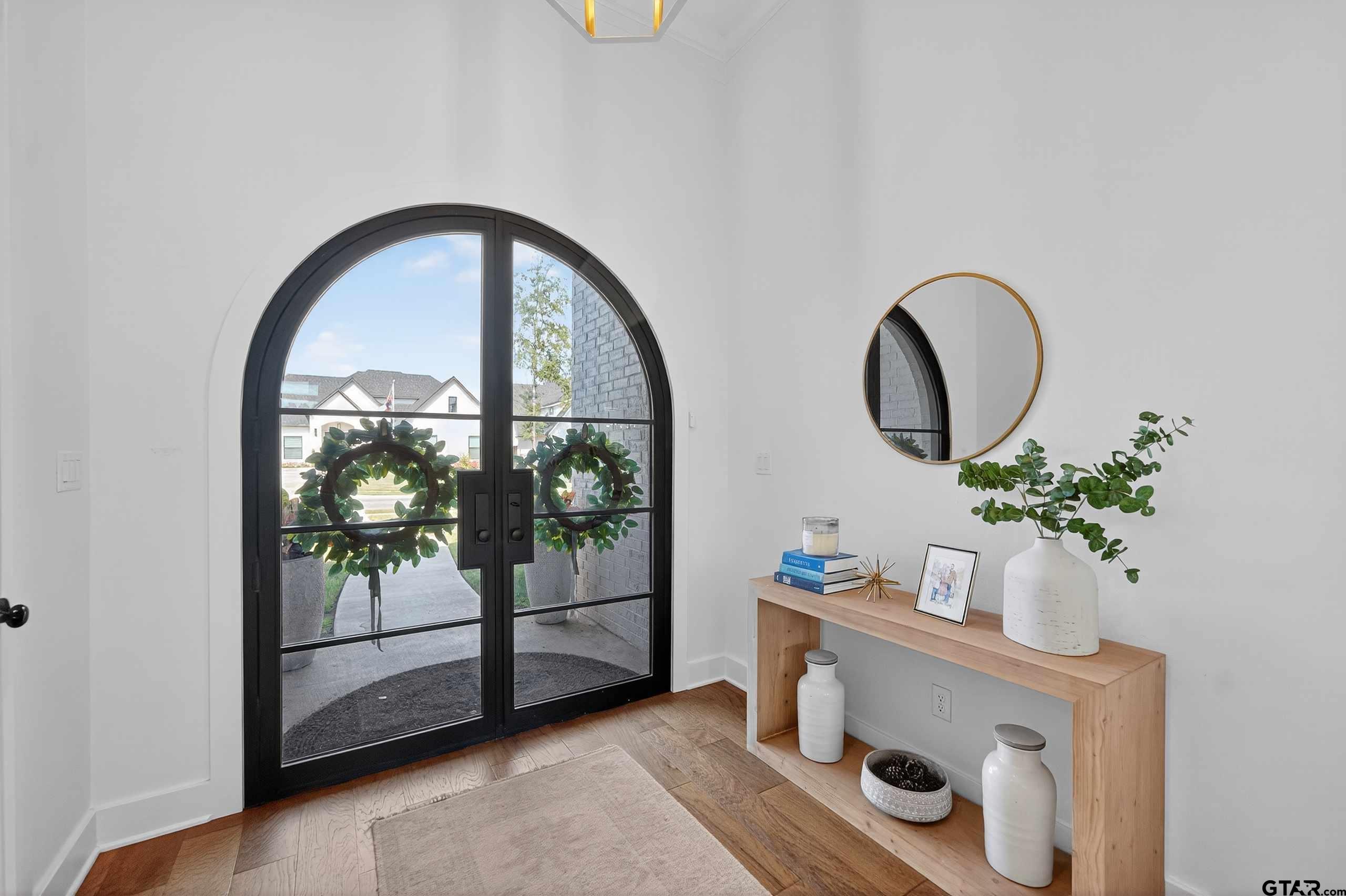 1572 Maple Lane Tyler, TX 75703 - Photo 4 of 47 a front view of a house with garden