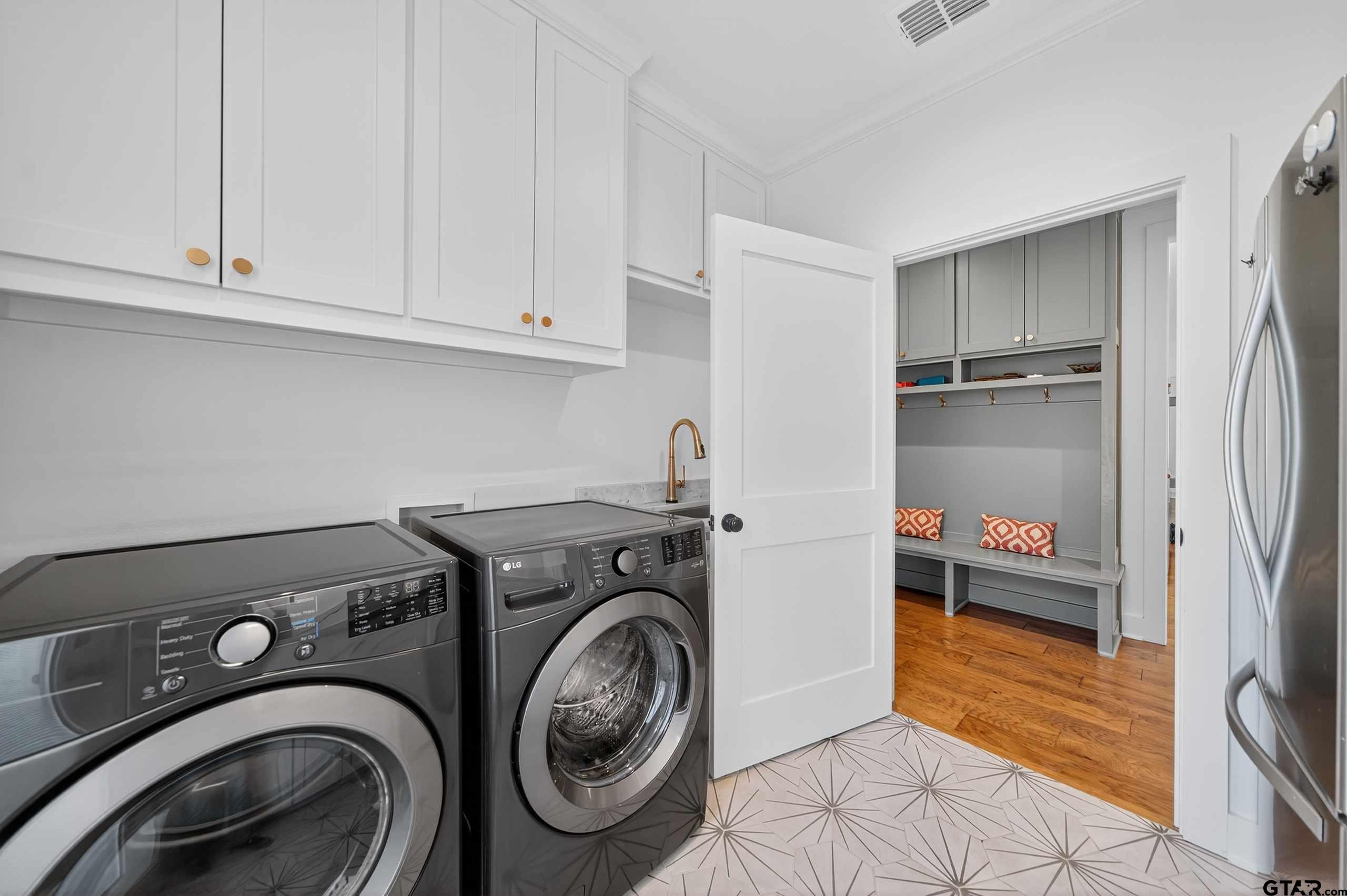 1572 Maple Lane Tyler, TX 75703 - Photo 42 of 47 a utility room with closet dryer and washer