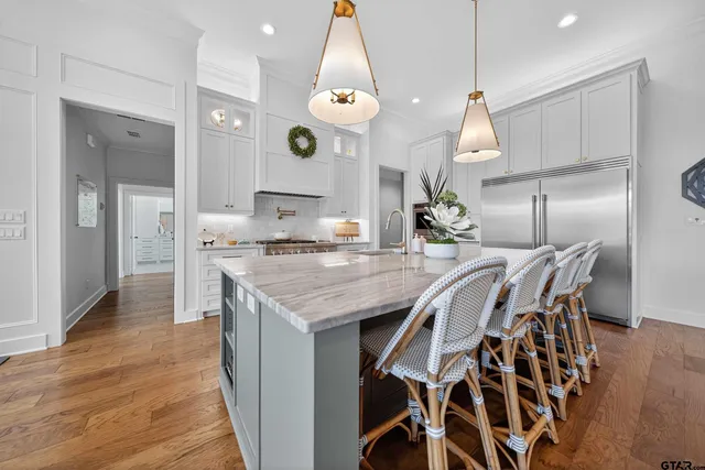 a open kitchen with a table and chairs