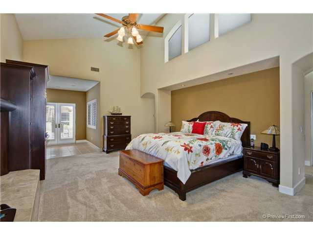 17704 Vineyard Lane Poway, CA 92064 - Photo 15 of 25 Master Bedroom includes custom Built In, Fireplace, French Door leads to the Pool and Spa