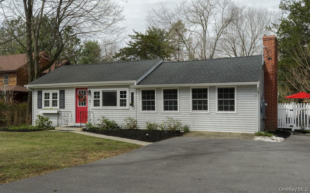 307 Sepasco Lake Road Rhinebeck, NY 12572 - Photo 21 of 24 a front view of a house with a yard
