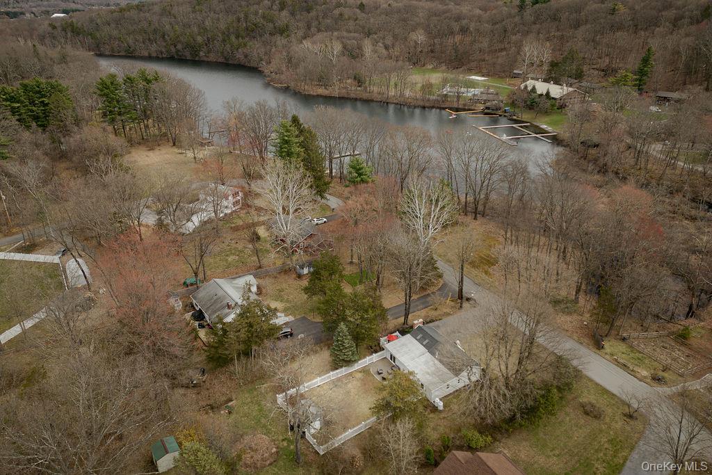 307 Sepasco Lake Road Rhinebeck, NY 12572 - Photo 22 of 24 a view of a lake from a yard