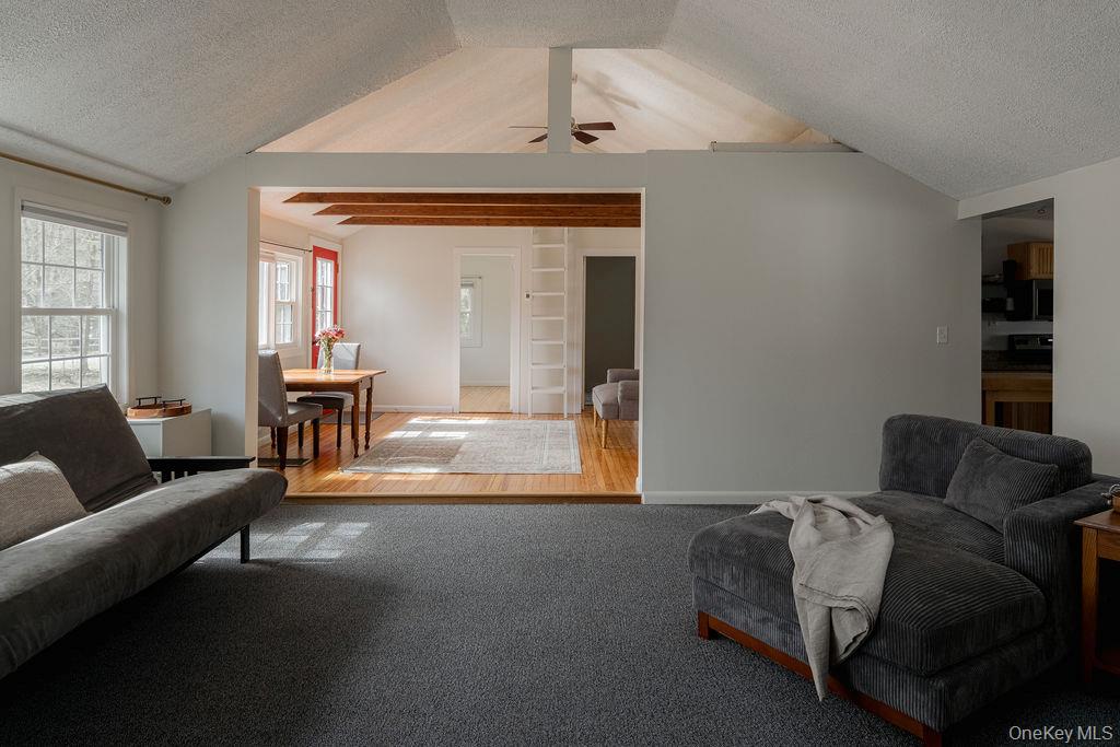 307 Sepasco Lake Road Rhinebeck, NY 12572 - Photo 8 of 24 a living room with furniture and a window