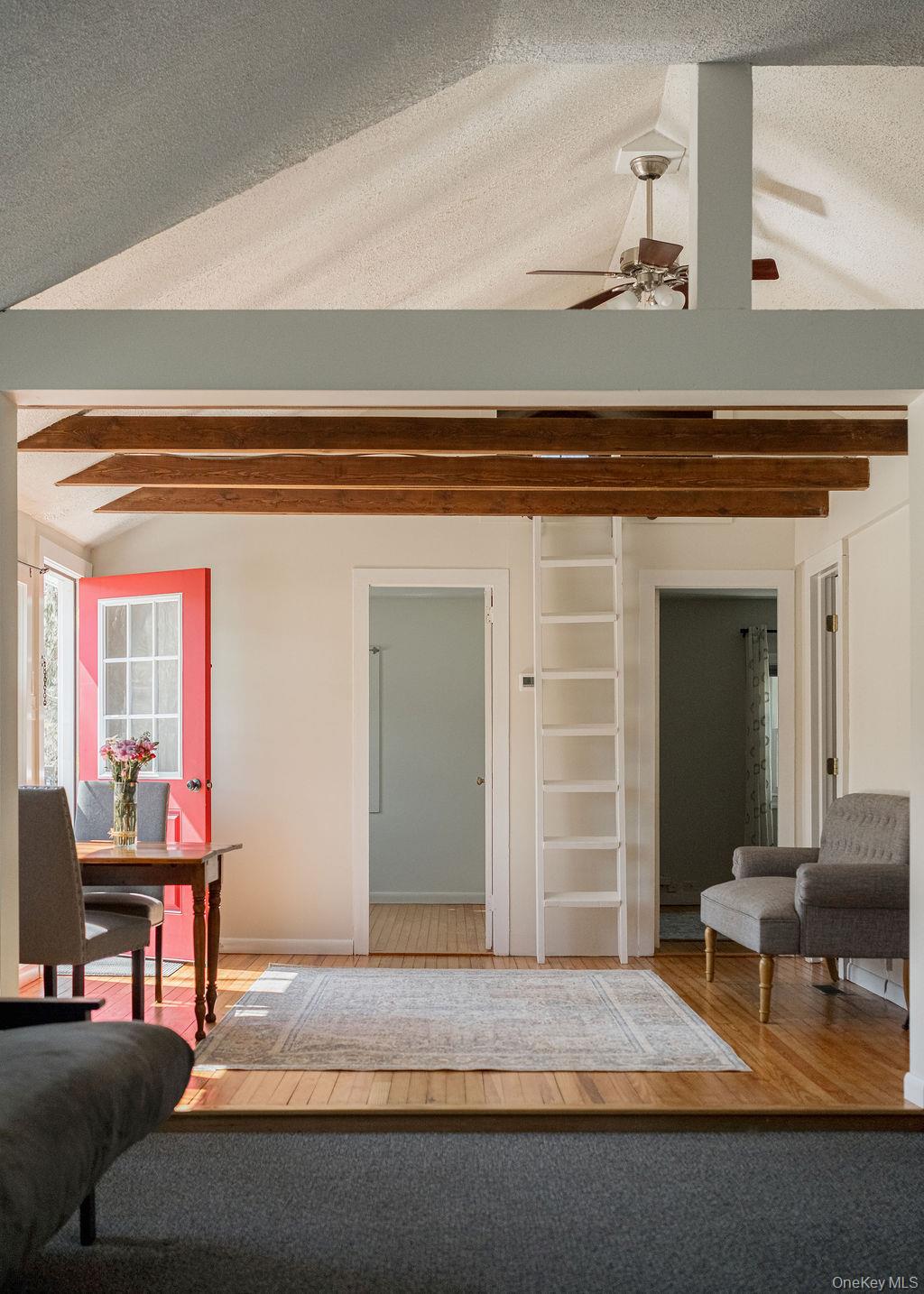 307 Sepasco Lake Road Rhinebeck, NY 12572 - Photo 9 of 24 a living room with a couch and a table