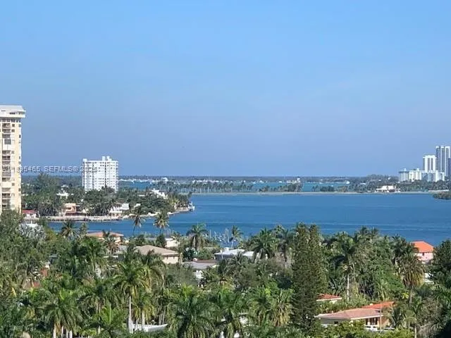 a view of a city with tall buildings in back