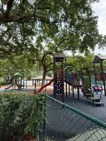 a view of swimming pool with a couch