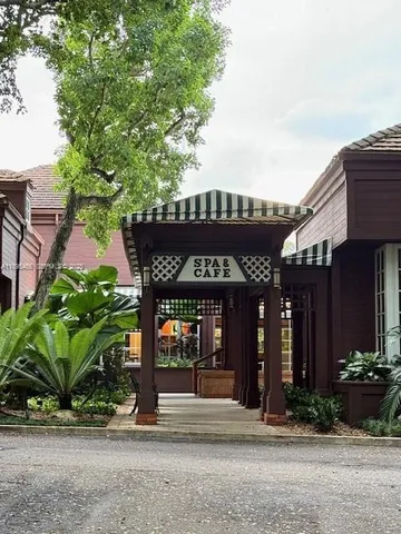 a room with gym equipment and mirrors