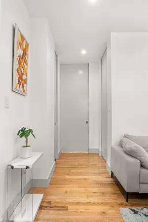 a bedroom with a bed and furniture