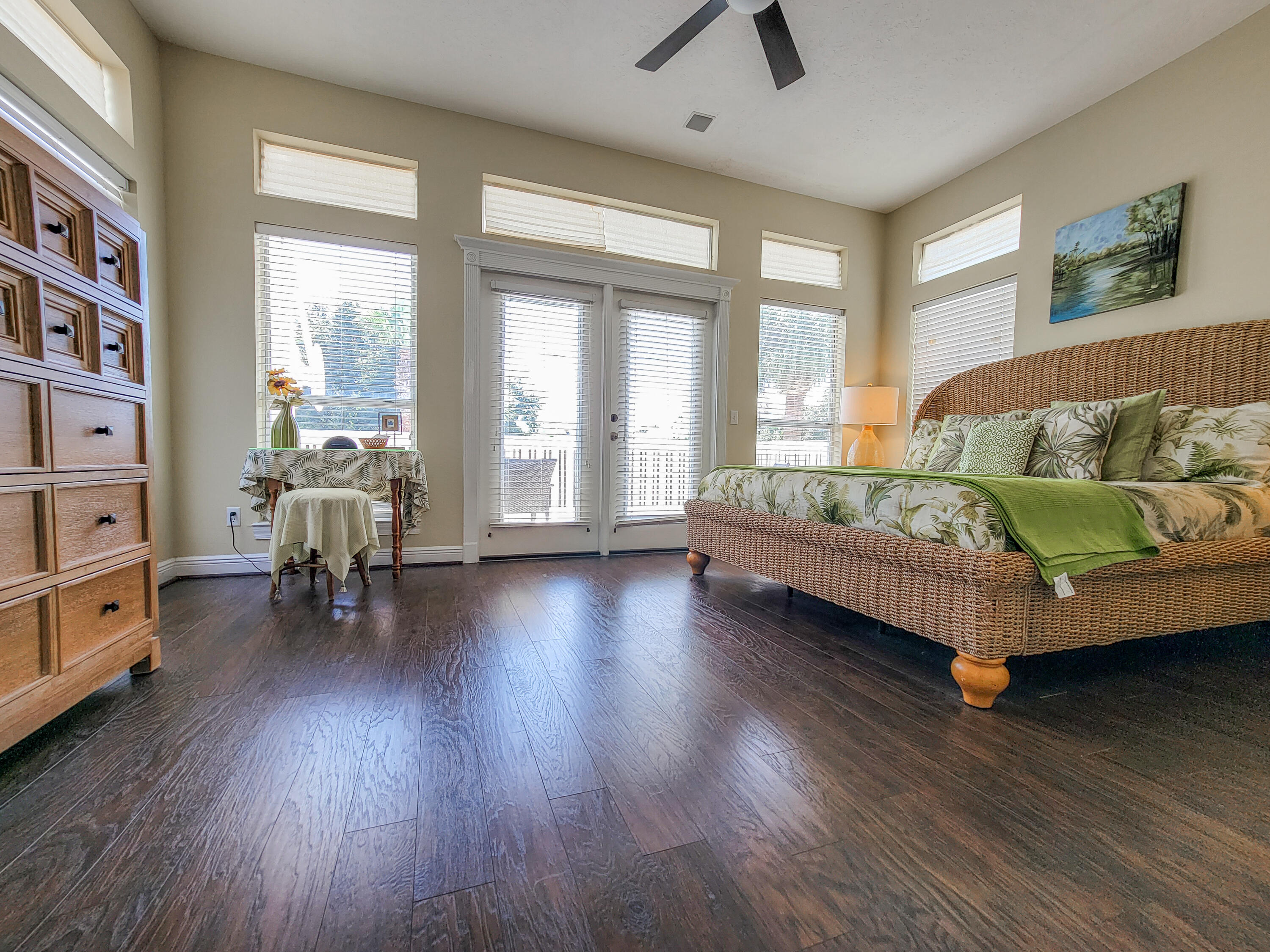 3567 East County Highway 30A Santa Rosa Beach, FL 32459 - Photo 15 of 31 a living room with furniture and a wooden floor