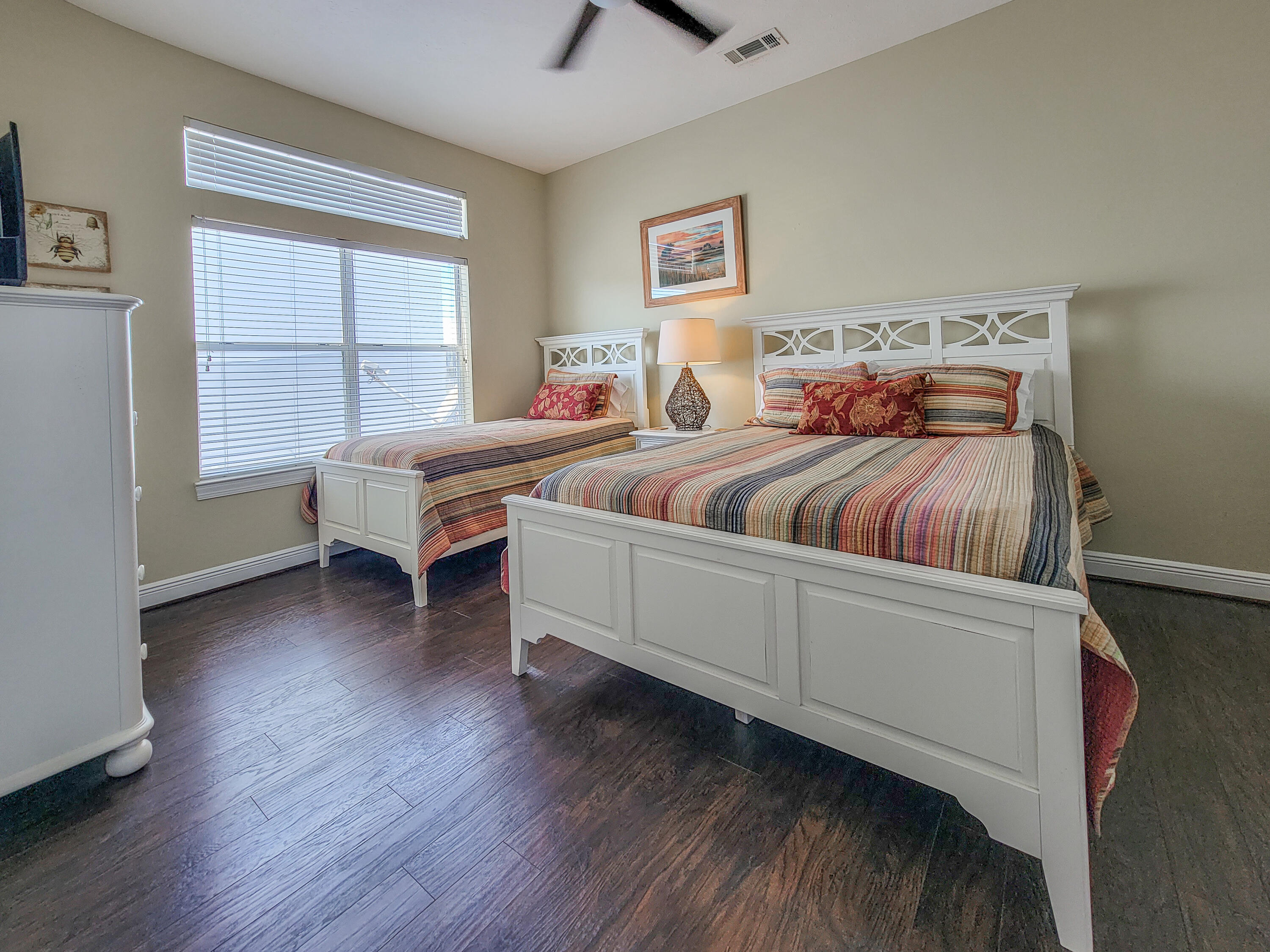 3567 East County Highway 30A Santa Rosa Beach, FL 32459 - Photo 17 of 31 a bedroom with a bed and a window