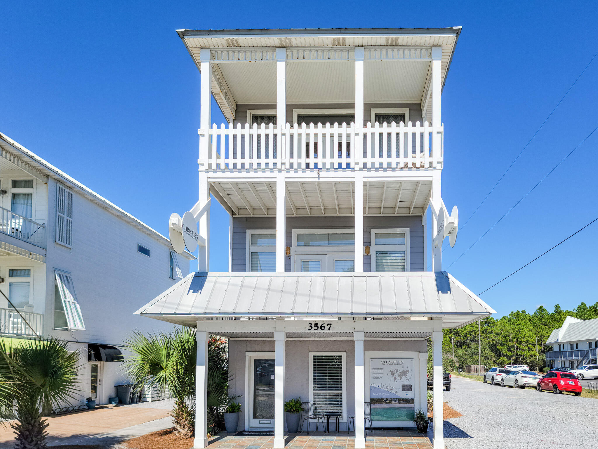3567 East County Highway 30A Santa Rosa Beach, FL 32459 - Photo 2 of 31 a front view of a house with a yard