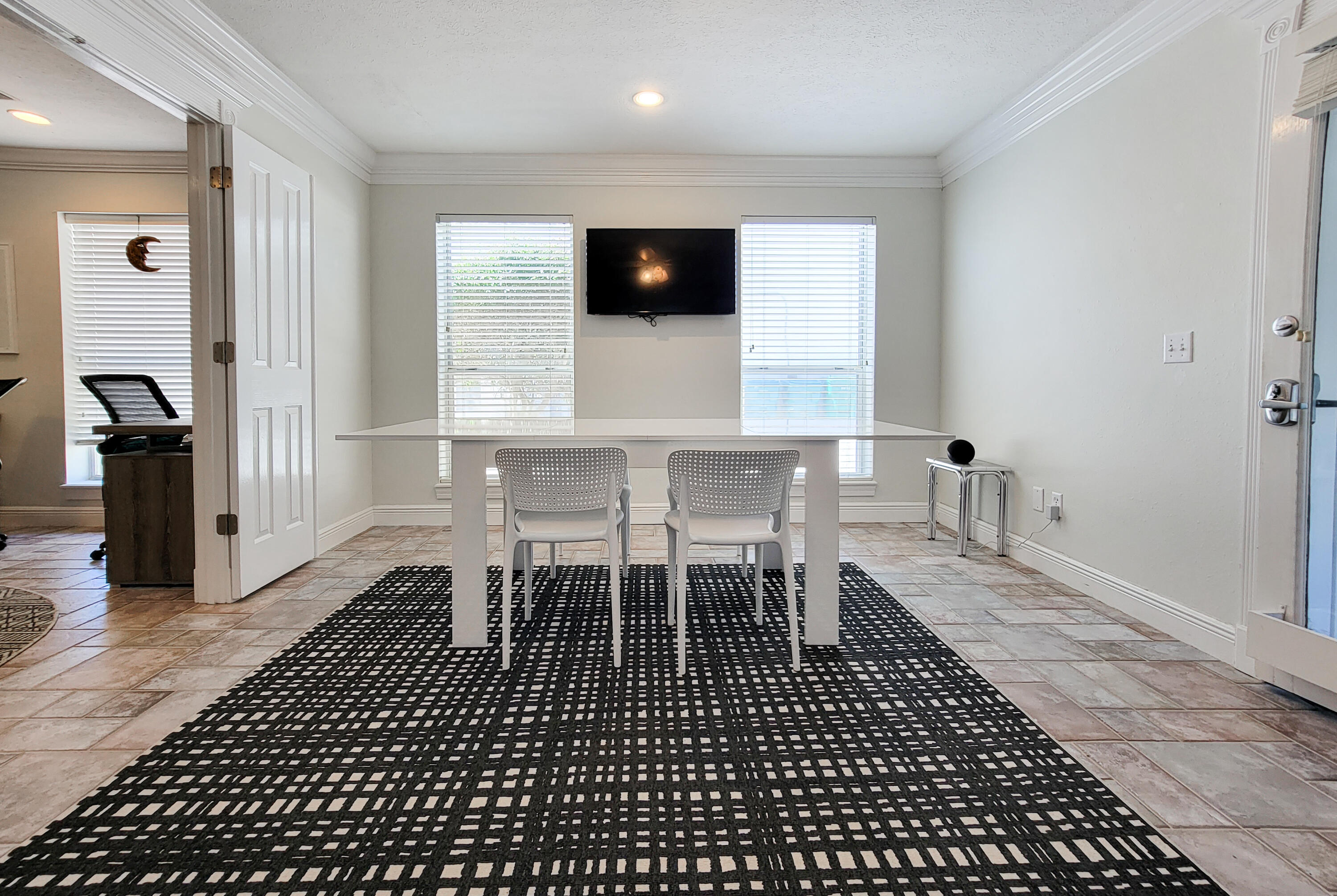 3567 East County Highway 30A Santa Rosa Beach, FL 32459 - Photo 23 of 31 a view of a dining room with furniture