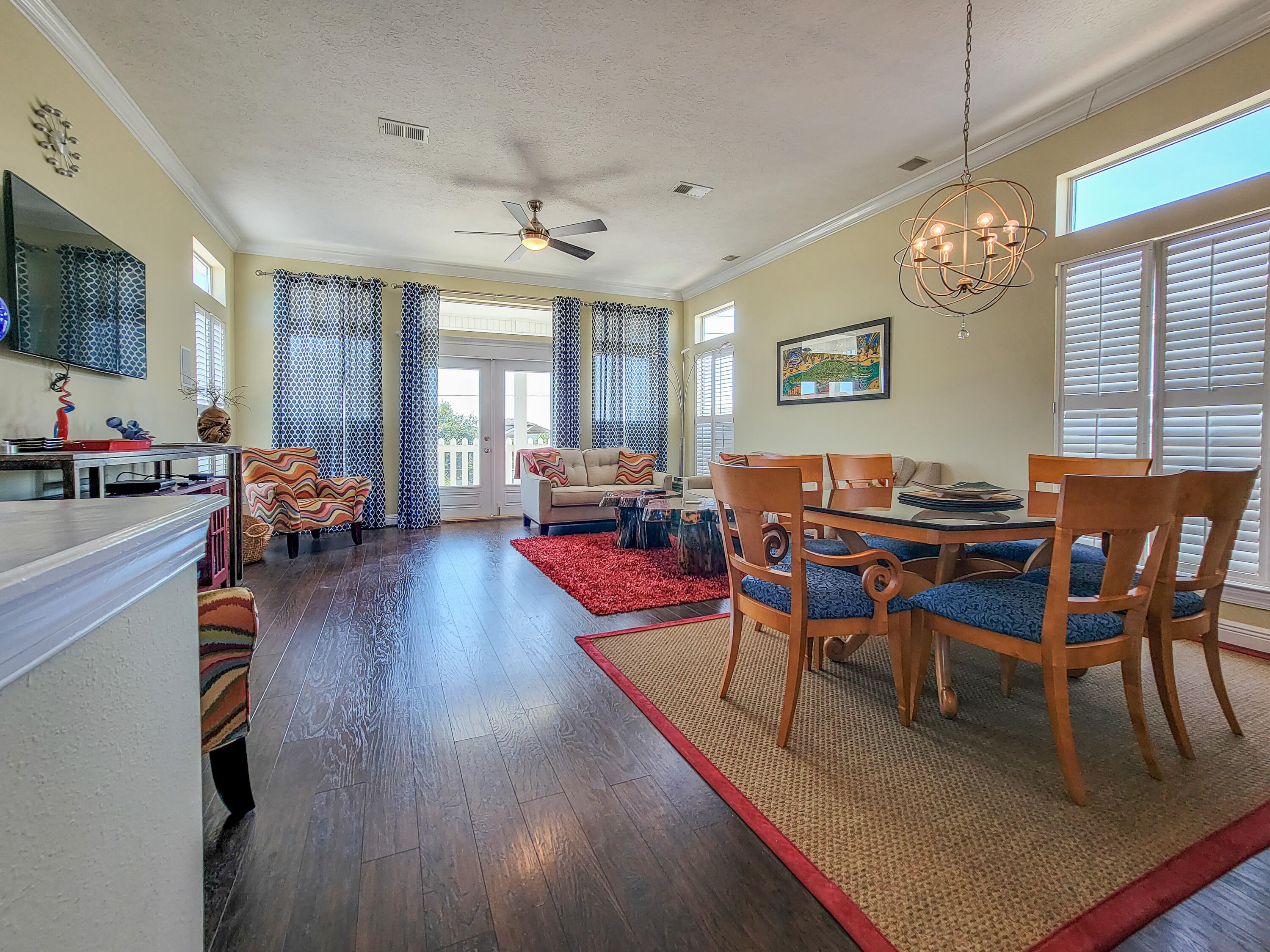 3567 East County Highway 30A Santa Rosa Beach, FL 32459 - Photo 3 of 31 a view of a dining room with furniture window and wooden floor