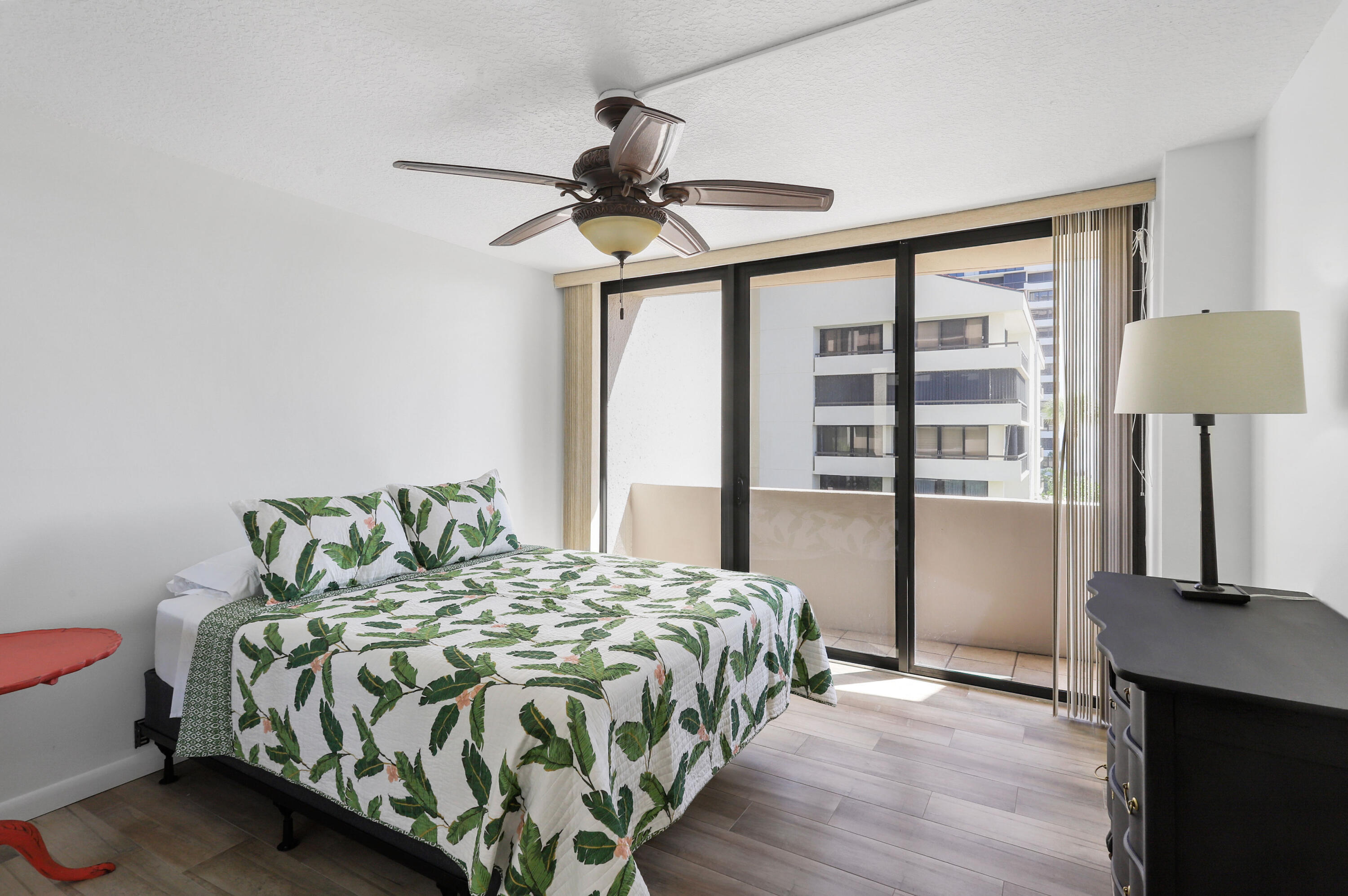 4200 North Ocean Drive, Unit 1 Riviera Beach, FL 33404 - Photo 16 of 59 a bedroom with a bed and a window