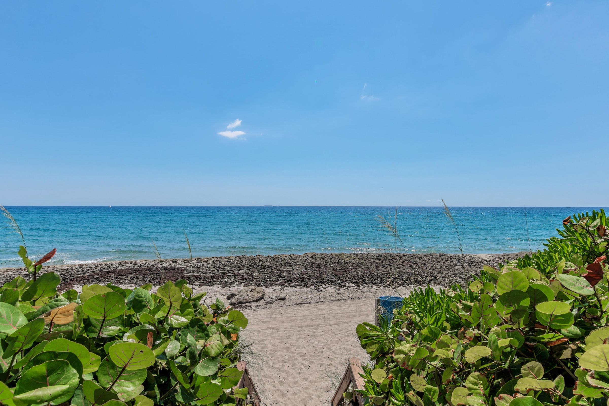4200 North Ocean Drive, Unit 1 Riviera Beach, FL 33404 - Photo 28 of 59 a view of a lake with a building in the background