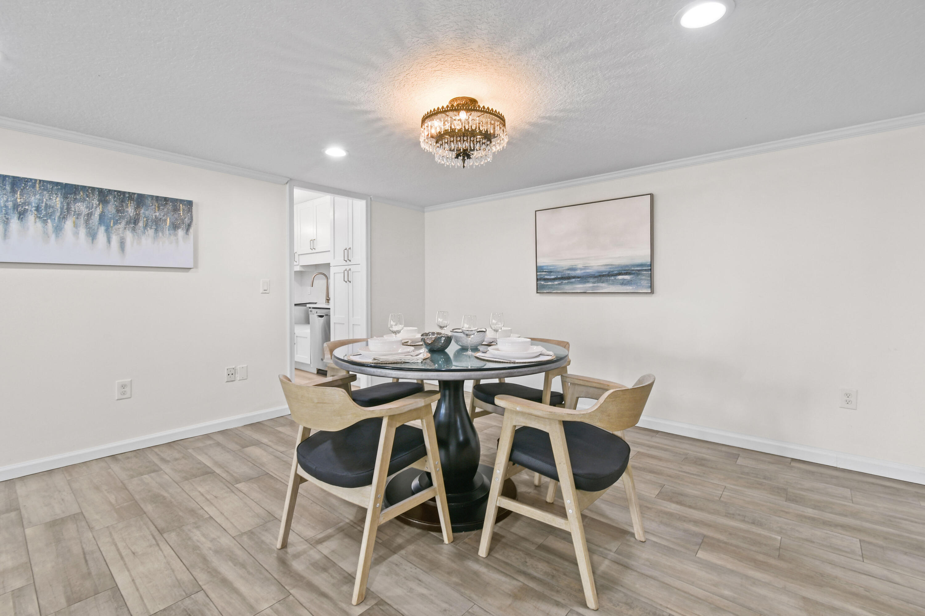 4200 North Ocean Drive, Unit 1 Riviera Beach, FL 33404 - Photo 40 of 59 a view of a dining room with furniture and wooden floor