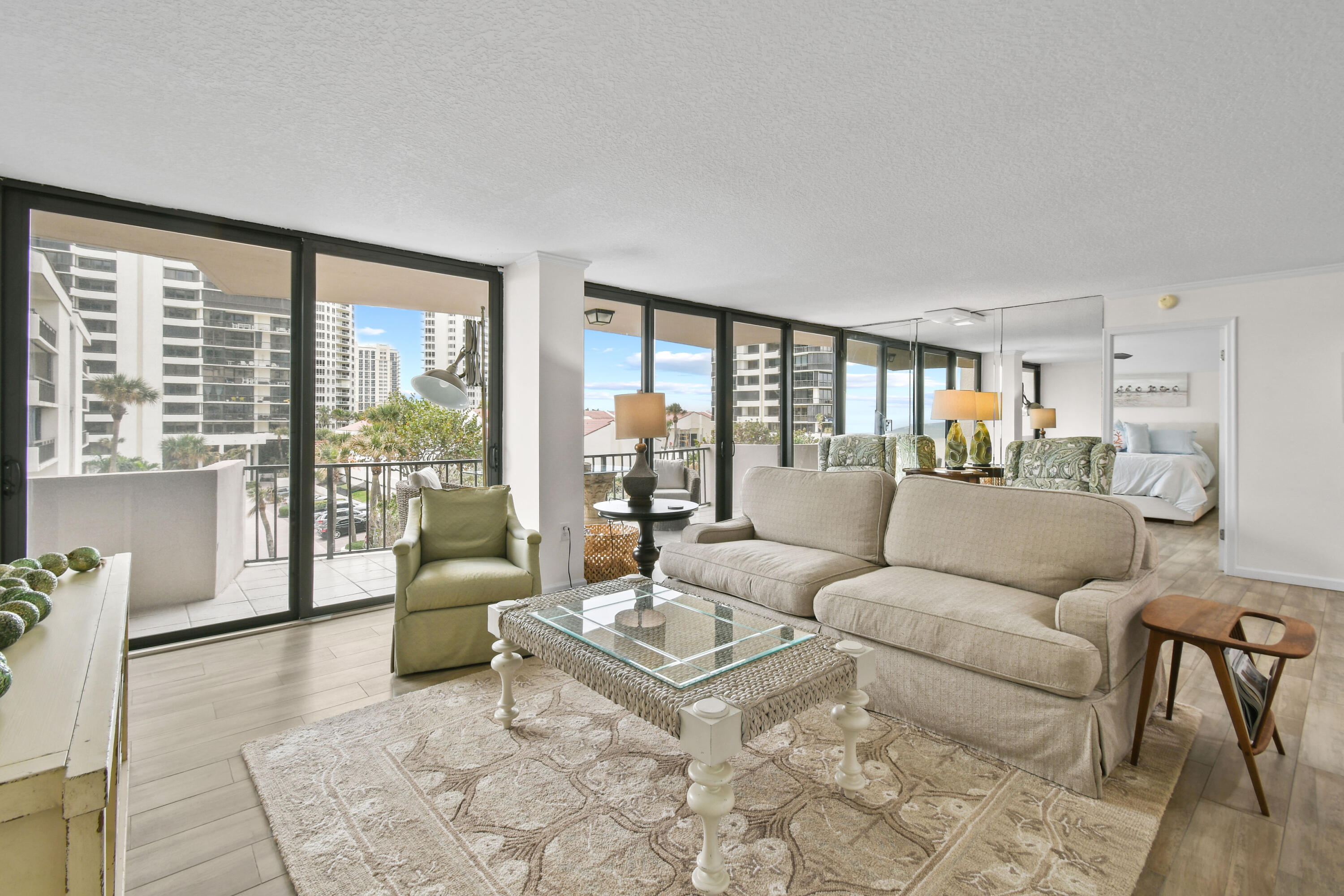 4200 North Ocean Drive, Unit 1 Riviera Beach, FL 33404 - Photo 47 of 59 a living room with furniture and a large window