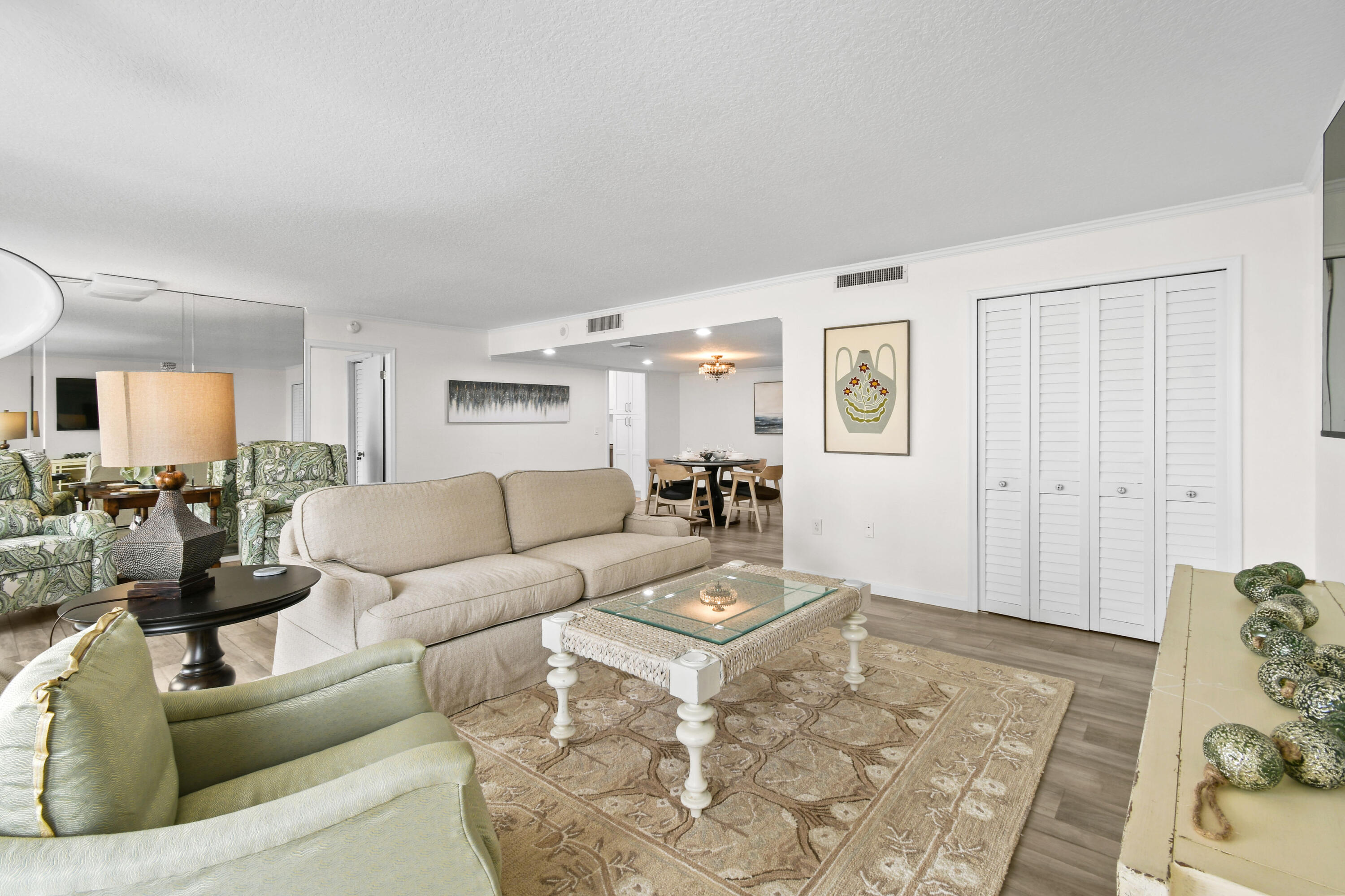 4200 North Ocean Drive, Unit 1 Riviera Beach, FL 33404 - Photo 48 of 59 a living room with furniture and wooden floor