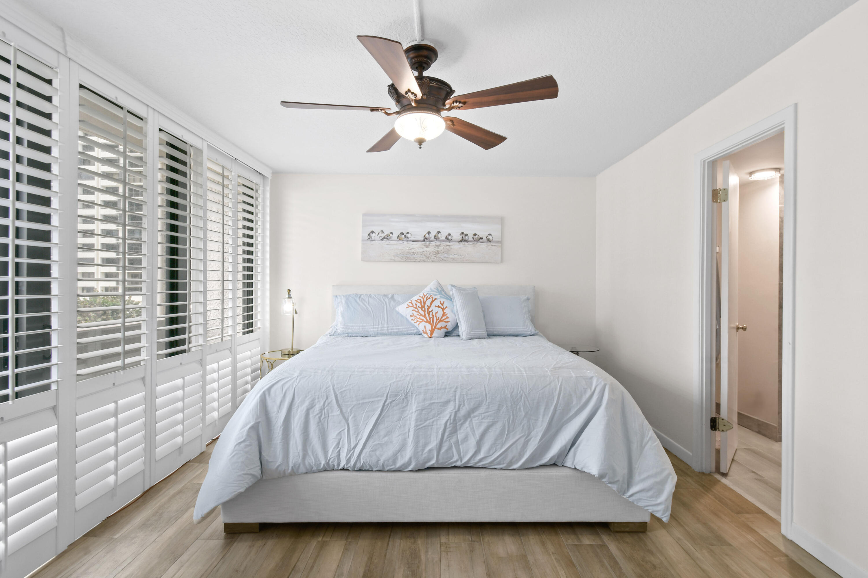 4200 North Ocean Drive, Unit 1 Riviera Beach, FL 33404 - Photo 51 of 59 a bedroom with a bed and window