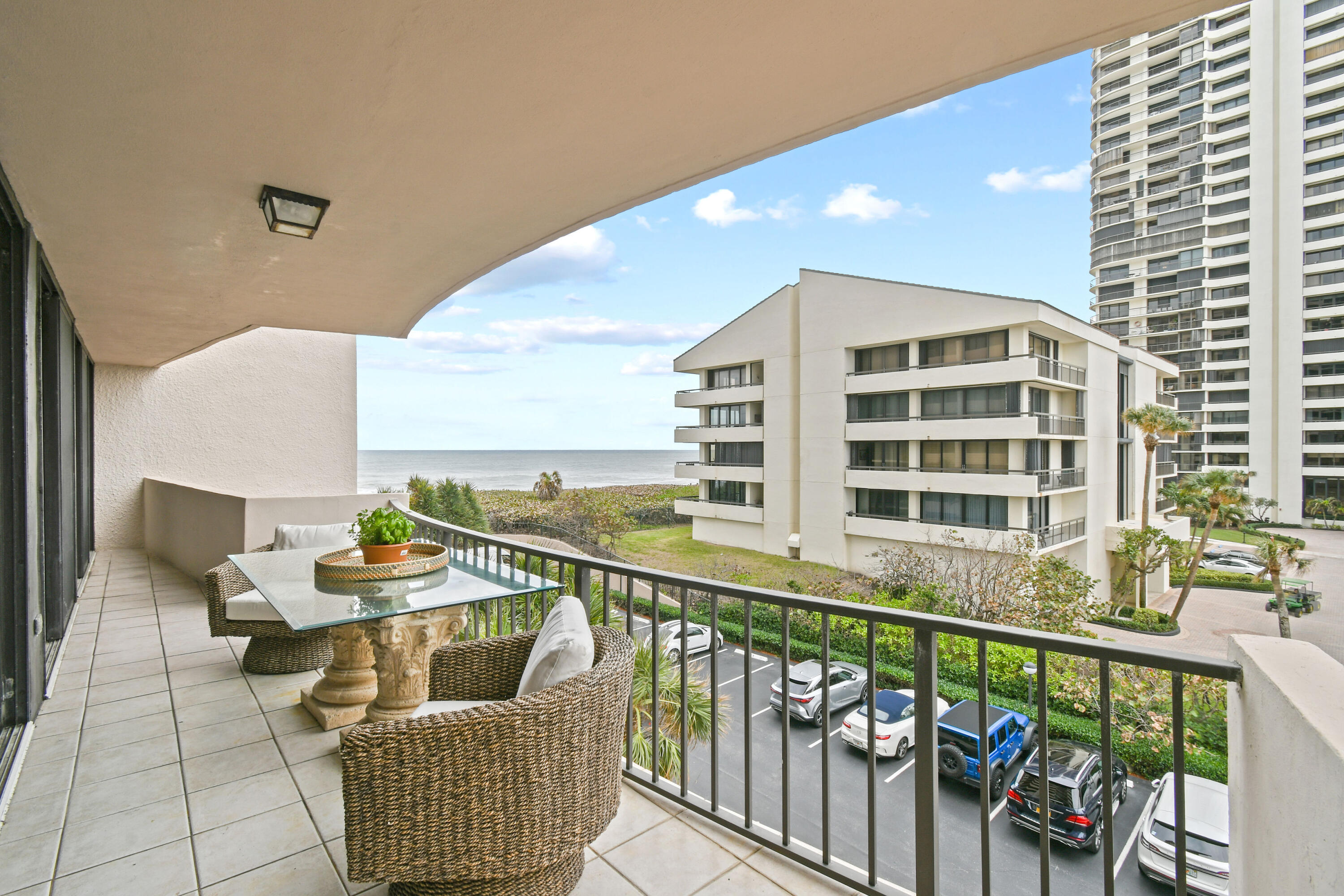 4200 North Ocean Drive, Unit 1 Riviera Beach, FL 33404 - Photo 57 of 59 a balcony with furniture and view of city