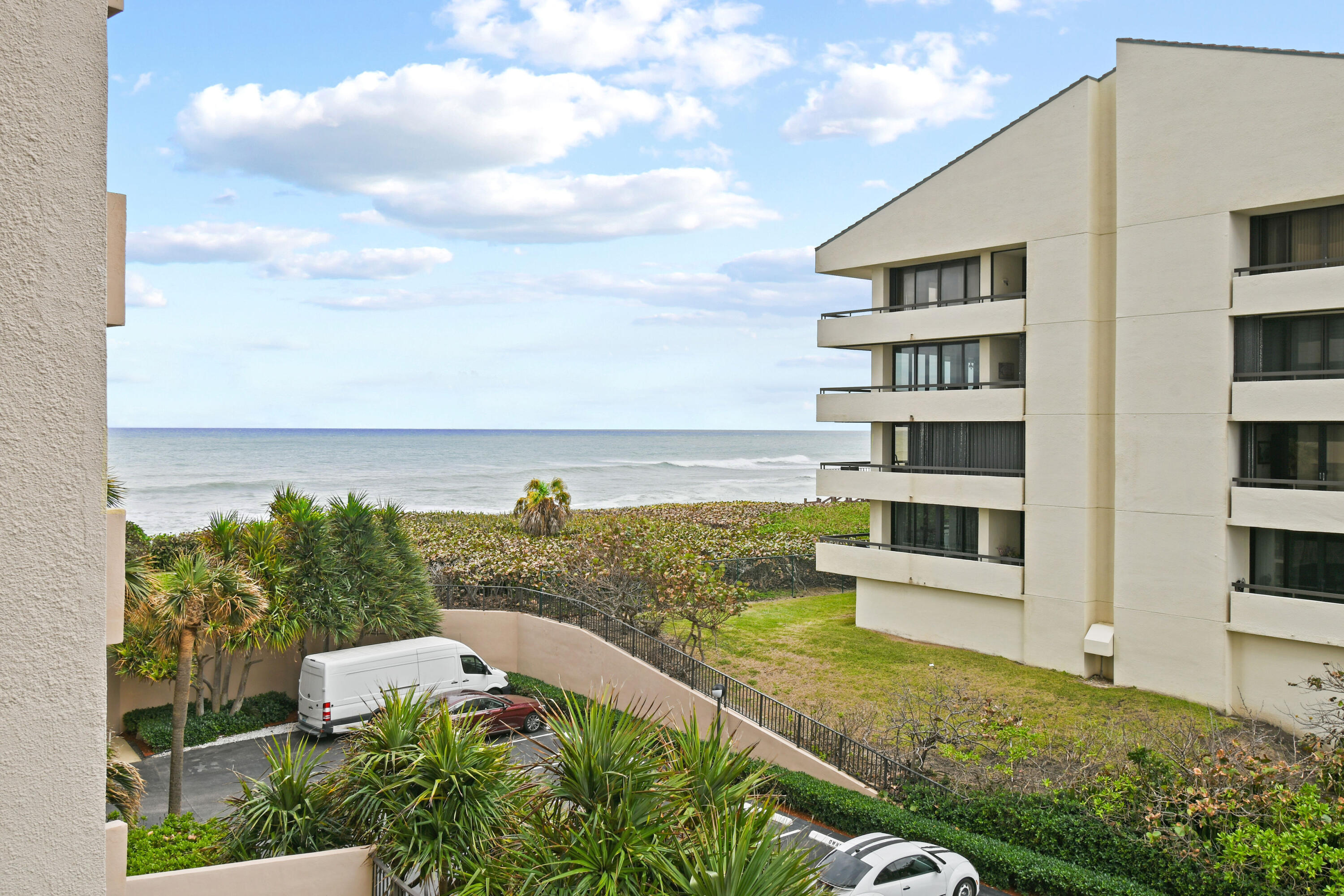 4200 North Ocean Drive, Unit 1 Riviera Beach, FL 33404 - Photo 59 of 59 a view of a swimming pool with an outdoor seating and a garden
