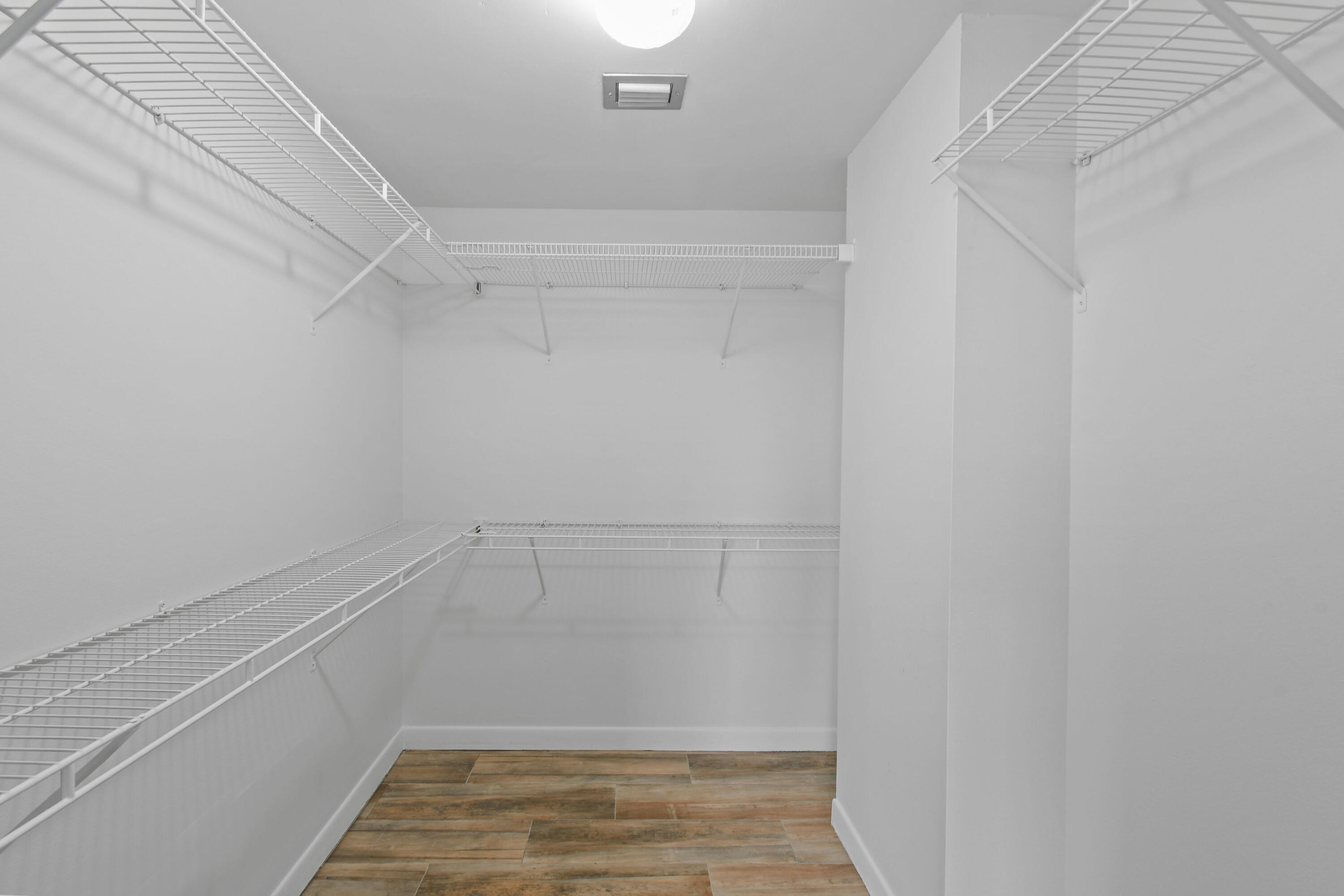 4200 North Ocean Drive, Unit 1 Riviera Beach, FL 33404 - Photo 10 of 59 a view of a room with racks on the wall