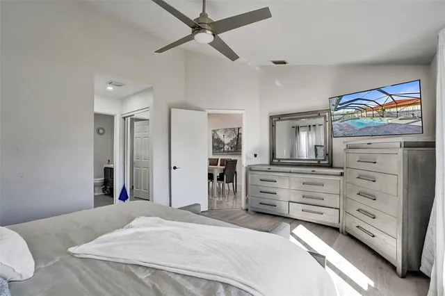 a bedroom with a bed and a dresser