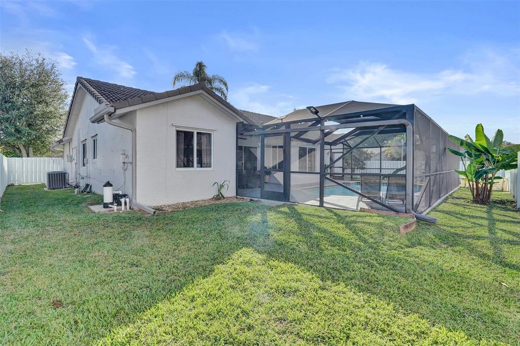 7909 Northwest 19th Street Margate, FL 33063 - Photo 32 of 33 a view of a house with a yard