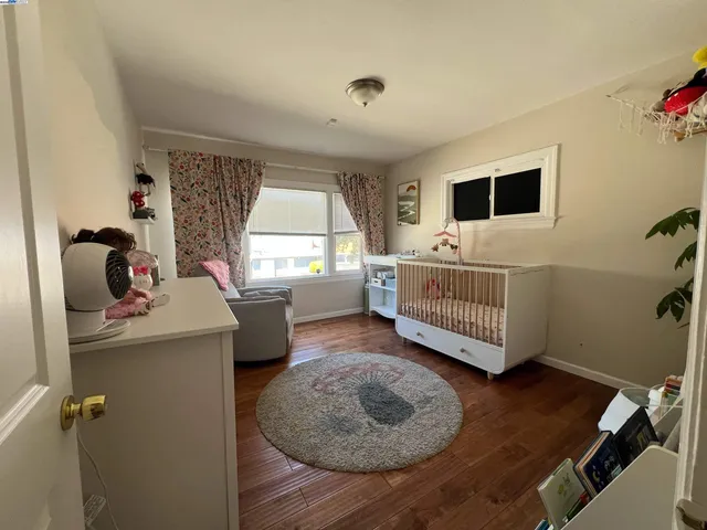 a living room with a couch and a window
