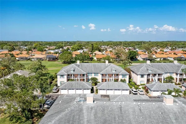 an aerial view of a house with a garden