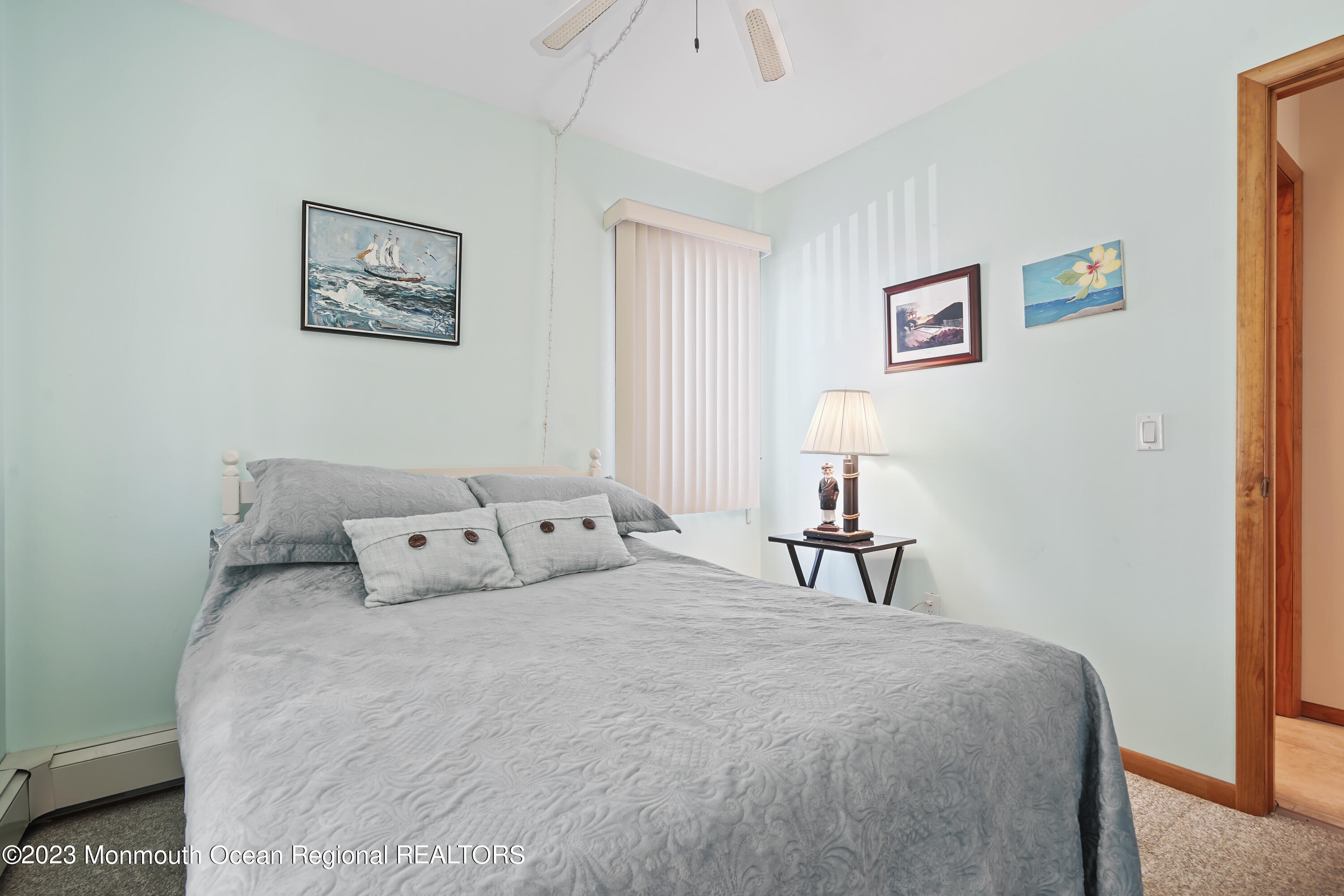 306 Ormond Drive Lavallette, NJ 08735 - Photo 18 of 49 a bedroom with a bed and a lamp on table