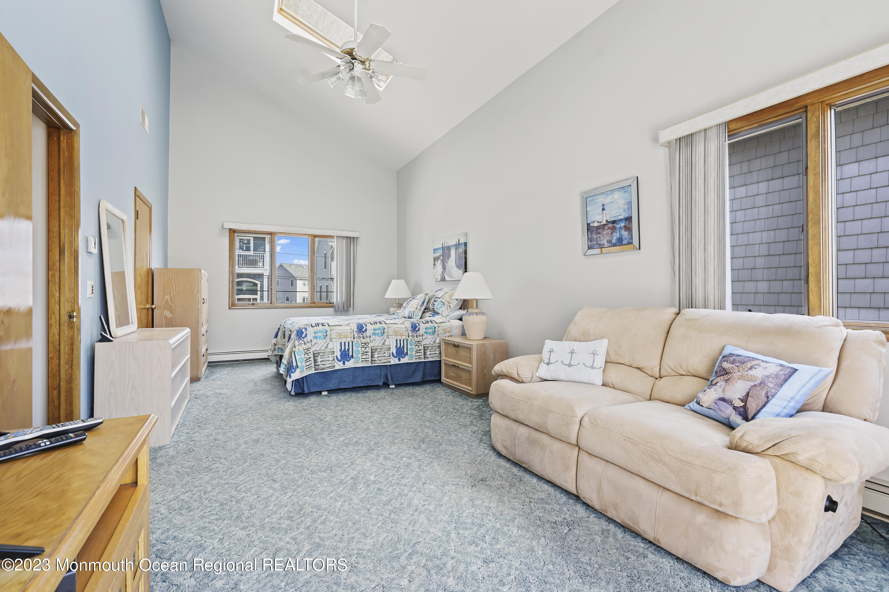 306 Ormond Drive Lavallette, NJ 08735 - Photo 21 of 49 a living room with furniture and a large window