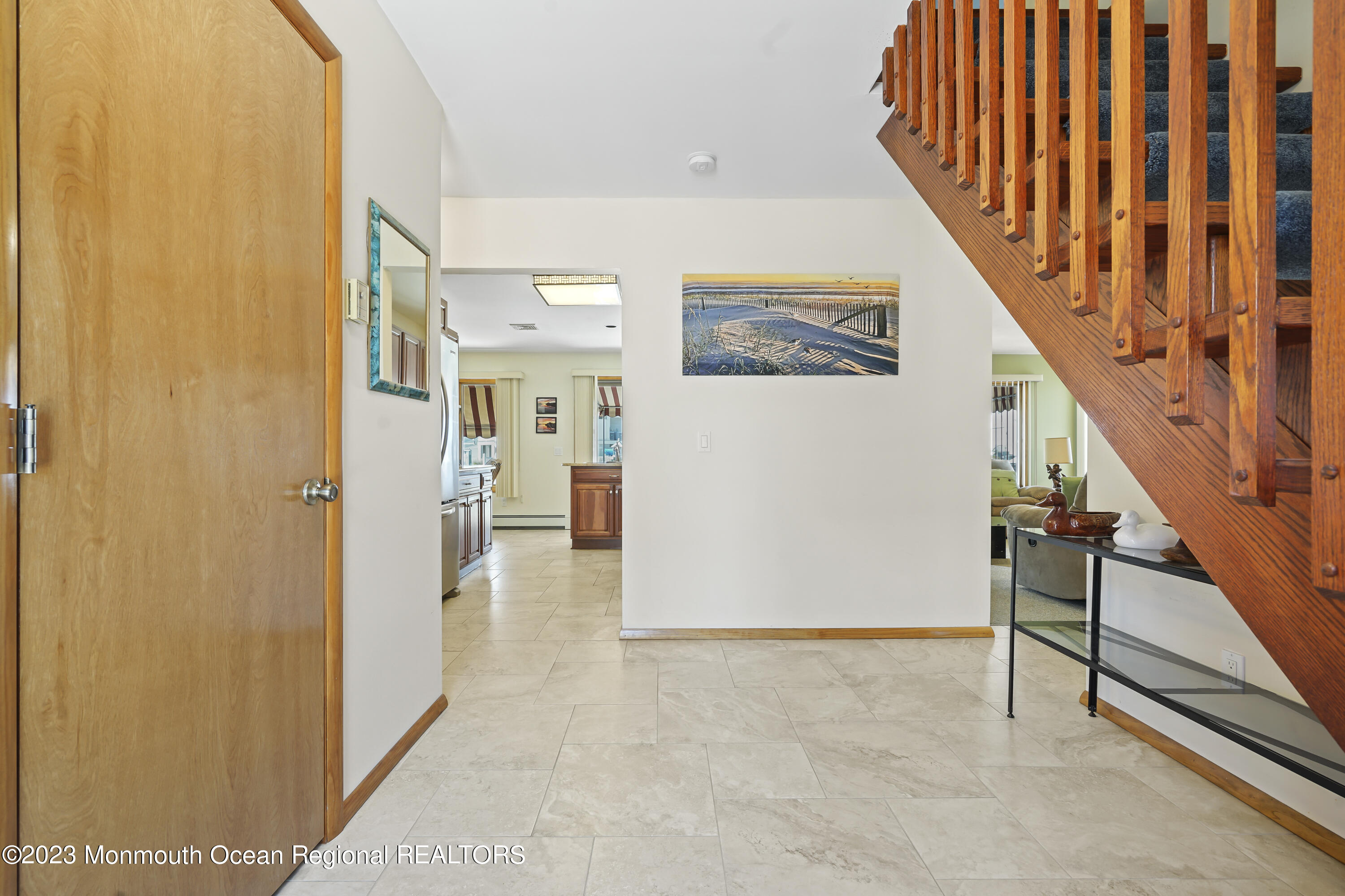 306 Ormond Drive Lavallette, NJ 08735 - Photo 29 of 49 a view of a hallway with wooden floor and staircase