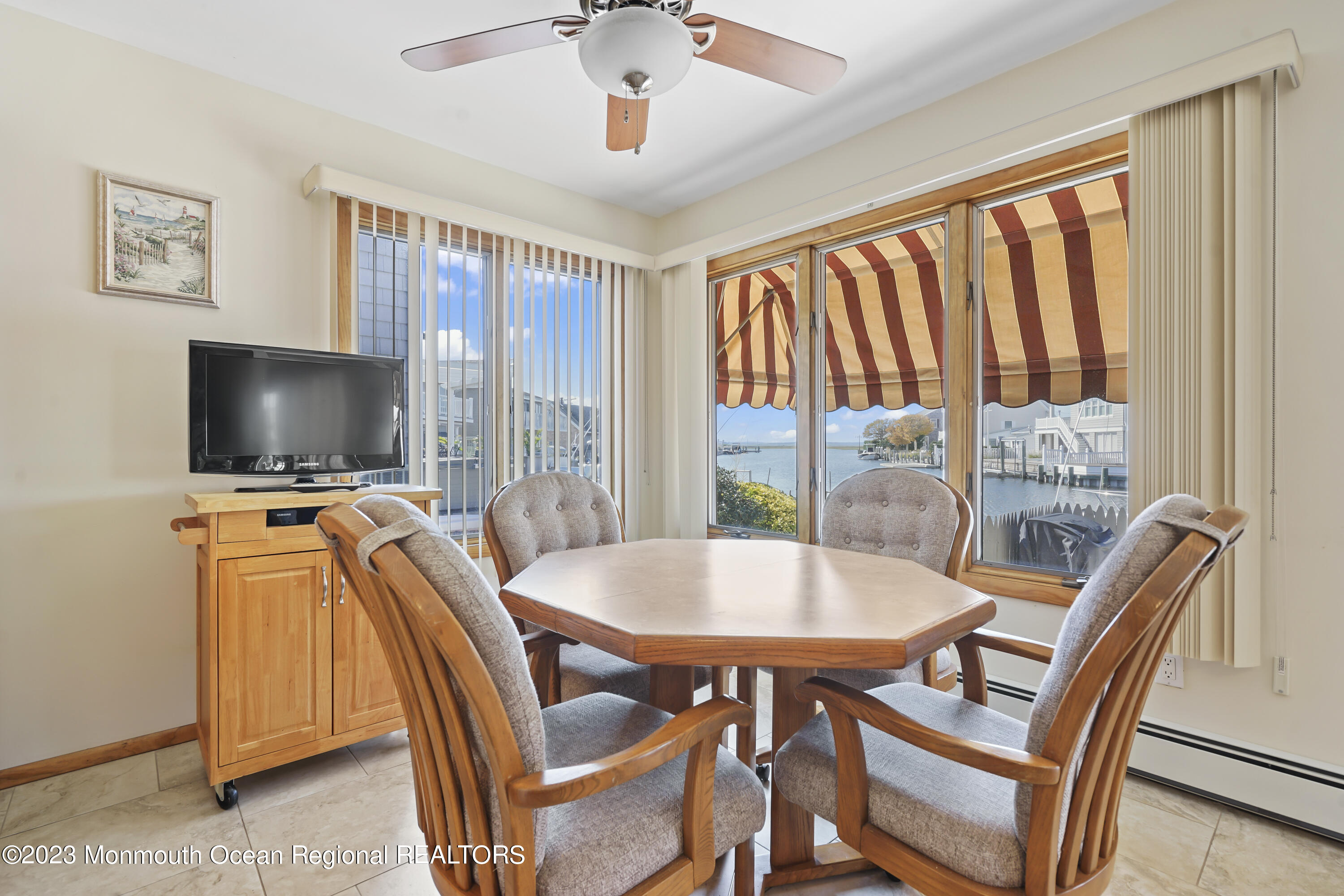 306 Ormond Drive Lavallette, NJ 08735 - Photo 34 of 49 a view of a dining room with furniture window and outside view