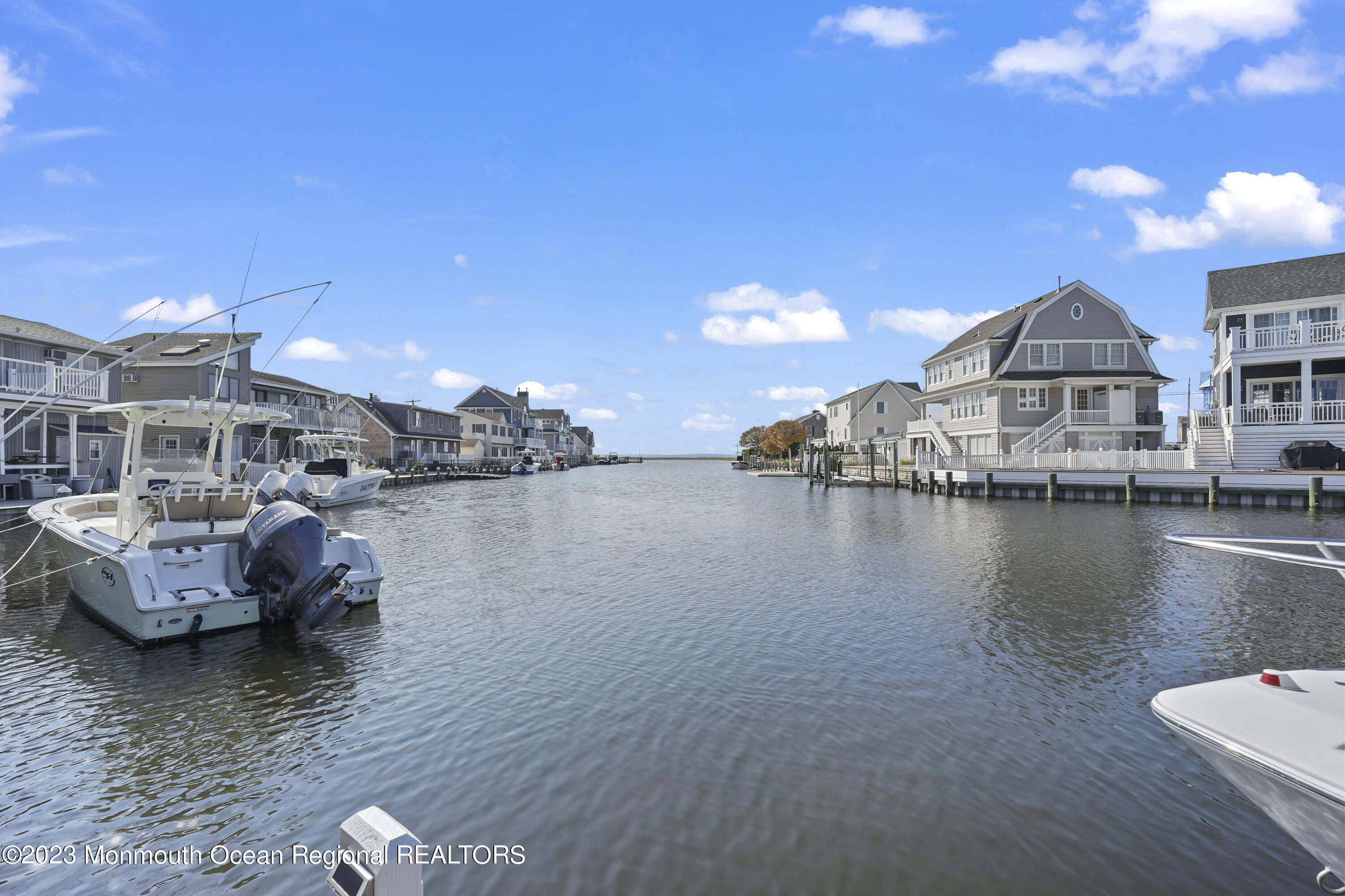 306 Ormond Drive Lavallette, NJ 08735 - Photo 44 of 49 a view of a lake with couches and city view
