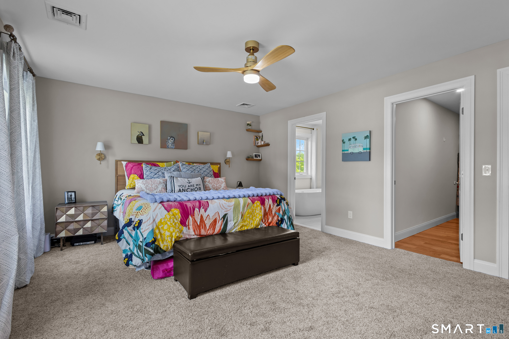 2 Martys Way Gales Ferry, CT 06335 - Photo 20 of 40 a bedroom with a bed and a chandelier