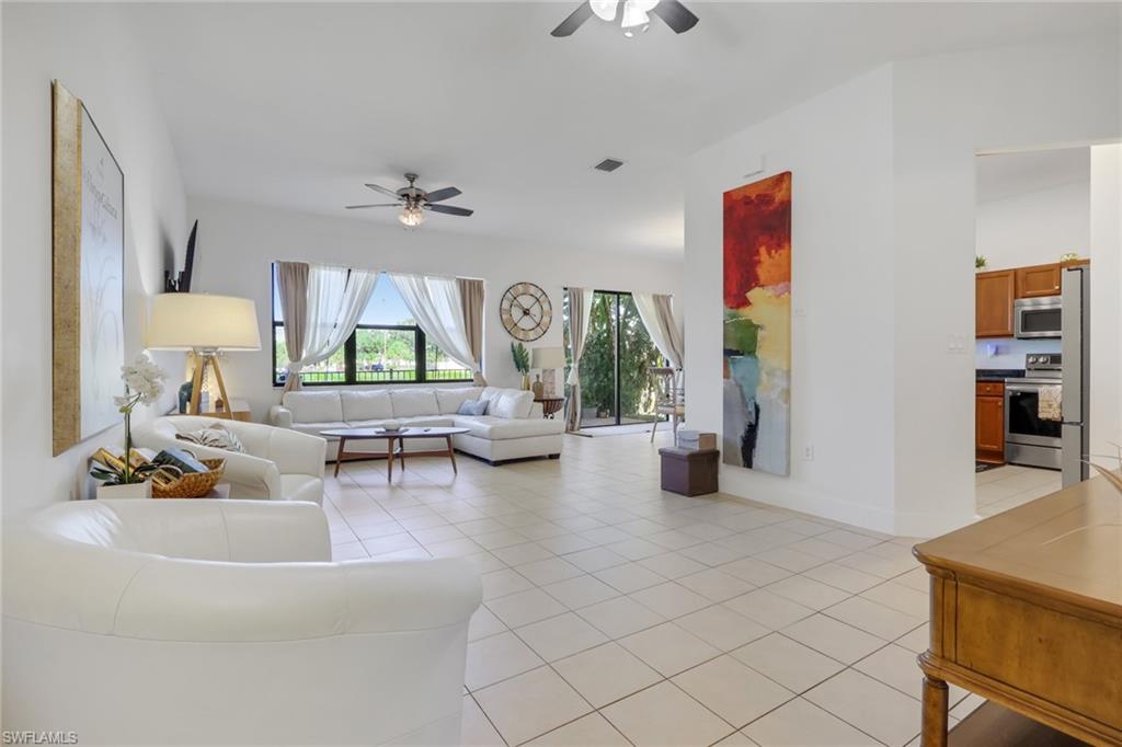 5289 Beckton Road Immokalee, FL 34142 - Photo 4 of 37 a living room with furniture and a large window
