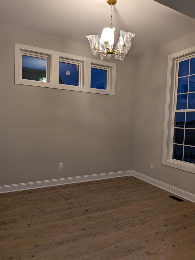 675 South Regulators Street Creston, IL 60113 - Photo 14 of 27 a view of livingroom with window