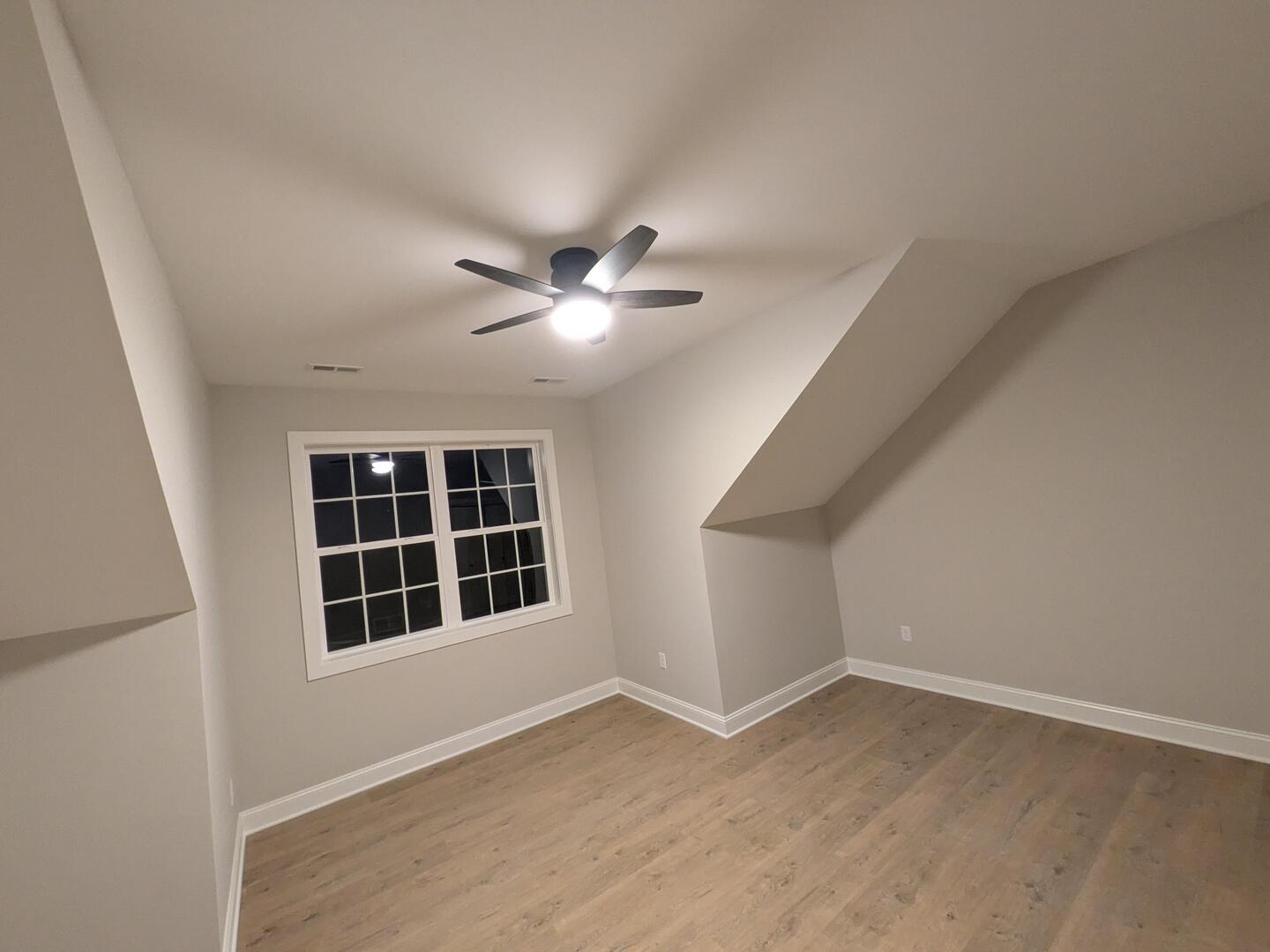 675 South Regulators Street Creston, IL 60113 - Photo 23 of 27 wooden floor in an empty room with a window