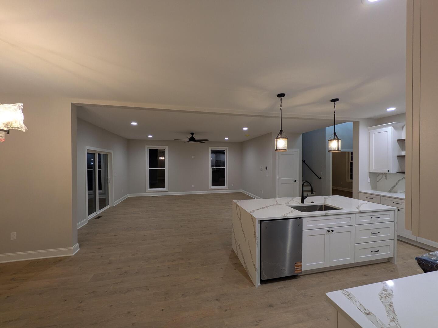 675 South Regulators Street Creston, IL 60113 - Photo 10 of 27 a open kitchen with a sink stove and cabinets